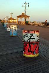 Painted garbage cans on boardwalk Coney Island